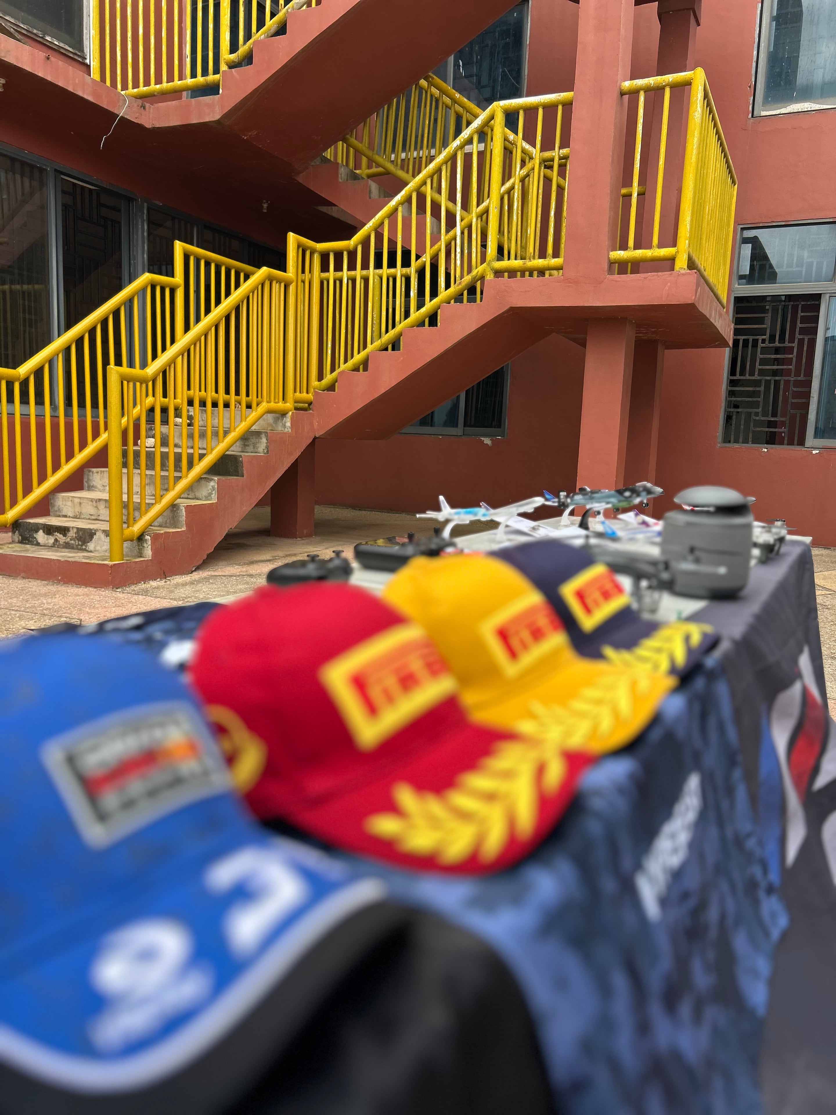 Caps, drones and planes on the table
